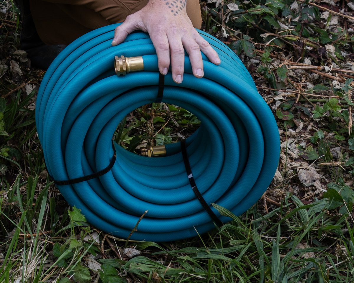 THE HOSE 3/4-inch banded coil on the grass