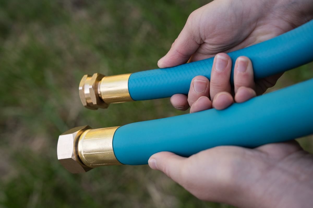 The 3/4 inch and 1 inch brass ends held side by side